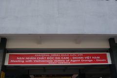 Banner announcing a meeting with Agent Orange victims at the War Remnants Museum in Ho Chi Minh City, Vietnam