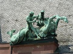 Mythological statue on the roof of Senckenberg Museum in Frankfurt