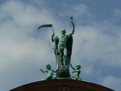 Mythological statue on the roof of Senckenberg Museum in Frankfurt am Main