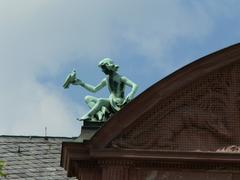 Mythological statue on the roof of the Senckenberg Museum in Frankfurt