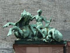 Mythological statue on the roof of Senckenberg Museum in Frankfurt