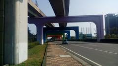 Rainbow over bridge near Tamsui and Bali