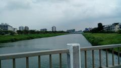 Kintetsu 17 series train crossing a river bridge in Japan