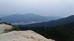 Dobongsan Mountain, Uijeongbu city and Suraksan Mountain viewed from Mt. Sapae