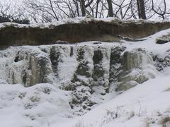 Frozen waterfall on the coast of the Baltic Sea from Olando kepurė hill