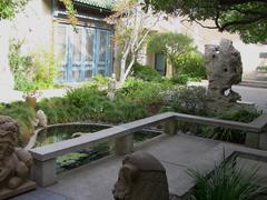 Pacific Asia Museum interior courtyard with garden and decorative carvings