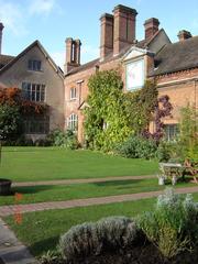 Packwood House with large sundial and ivy