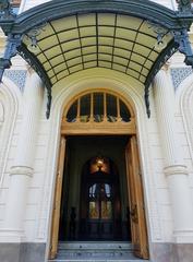 iron and glass marquee at the main entrance of Palacio Cousiño