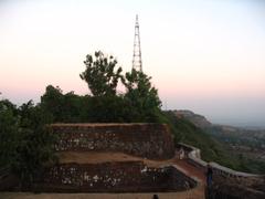 Scenic view of ancient Panhala fort walls with lush greenery