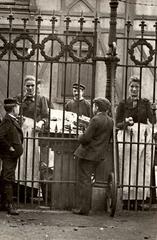 Sellers of monkey nuts at the gates of Artis Zoo in Amsterdam 1917