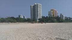 apartment buildings in Kannur, India from Payyambalam beach