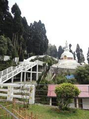 Buddha temple in Darjeeling surrounded by greenery