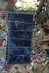 Magic Gardens mosaic artwork featuring colorful tiles and broken mirrors