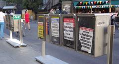 newspaper vending machines at Bourg-de-Four, Geneva