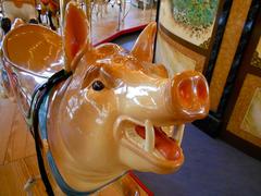 Detailed pig figure on Dentzel Carousel at Please Touch Museum