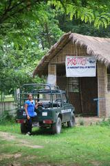 Jeep safari vehicle with a local tourist in Haduk, near Pabitora Wildlife Sanctuary