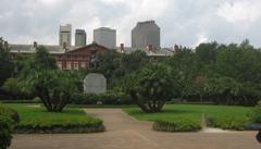 Jackson Square equestrian statue with hurricane Katrina damage visible on nearby building