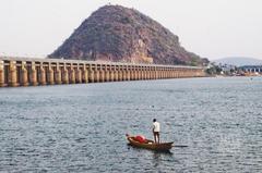 Fisherman catching fish in Krishna River