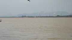 Bhavani Island panorama featuring greenery, water bodies, and archaeological elements