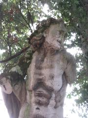 permanent statue of an old woman at Giardini della Biennale in Venice