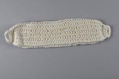 Dambinda made of soft cotton yarn folded into three layers with crochet straps at each end