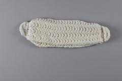 Dambinda made of soft cotton yarn with crochet loops at both ends