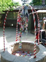 wishing well filled with pacifiers