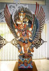 Balinese wooden statue of Wishnu riding Garuda