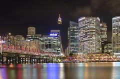 Darling Harbour at night with Centre Point Tower, Pyrmont Bridge, and Cockle Bay Wharf in view