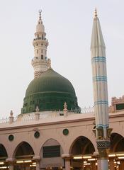 Green Dome of Al-Masjed Al-Nabawi with sunshade umbrella in folded position