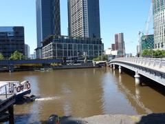 Queens Bridge spanning Yarra River with view of Southbank