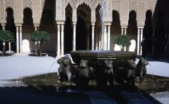 The Alhambra palace illuminated at sunset