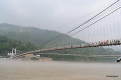 Ram Jhula bridge over the Ganges River in Rishikesh