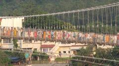 Close up of Pilgrims on Ram Jhula bridge, Rishikesh