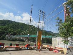 Ram Jhula bridge in Rishikesh with scenic surroundings