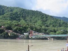 Ram Jhula bridge in Rishikesh with scenic surroundings