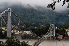 Pilgrims crossing Sivananda bridge, Ram Jhula, Rishikesh