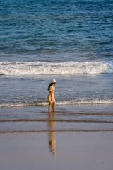 Pretty women at the beach during dusk