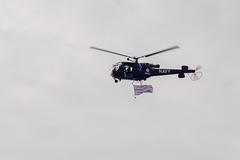 Naval helicopter at Beach Clean-Up Event