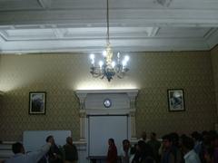 Interior view of a historic lodge with archways and pillars