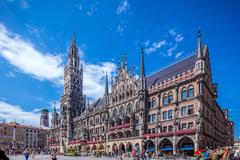 New City Hall on Marienplatz in Munich with a person taking a photo