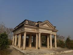 Obelisk at Raymond's Tomb under clear blue sky