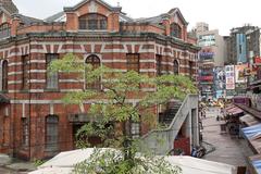 Ximen Red House Octagon Building close-up and Moe Point Maid Cafe in the background