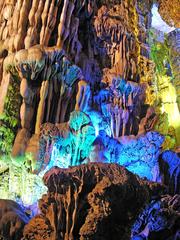 Reed Flute Cave in Guilin illuminated by colored lighting displaying various formations