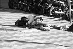 Homeless person on the ground