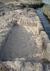 Ancient tomb in Egnazia by the sea shore