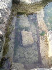 Ancient tomb on the sea shore in Egnazia, Italy