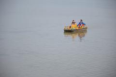 Evening view of Sukhna Lake with boats and people during WikiConference India 2016