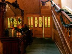 Ground floor doorway next to staircase in Rippon Lea house