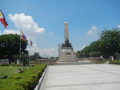 Rizal Park landmarks and attractions, including La Madre Filipina, historical markers, Rizal Fountain, and Independence Flagpole